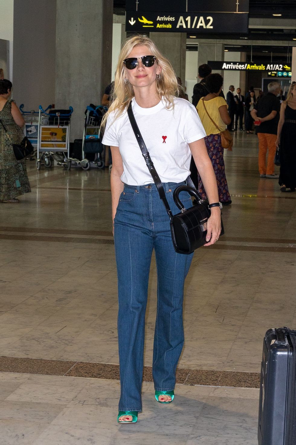 cum sa te imbraci pentru calatorii aeroport arata melanie laurent